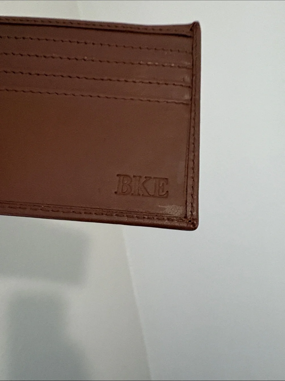 BKE Brown Leather Bifold Wallet with Embossed Flag
